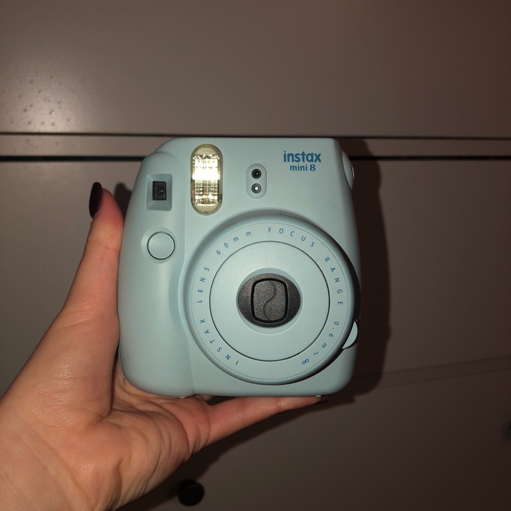 light blue instax mini 8 fujifilm camera